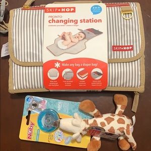 Baby changing station and pacifier bundle